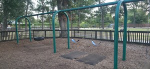 Swing set on the playground at Leonard Park.