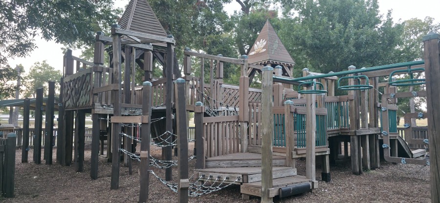 Wide view of the playground structures at Leonard Park.