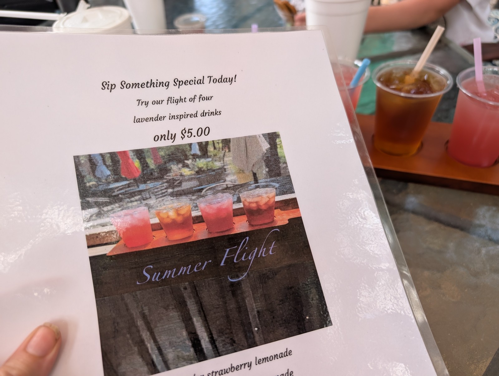 The Summer Flight card: four lavender-inspired drinks for five dollars.