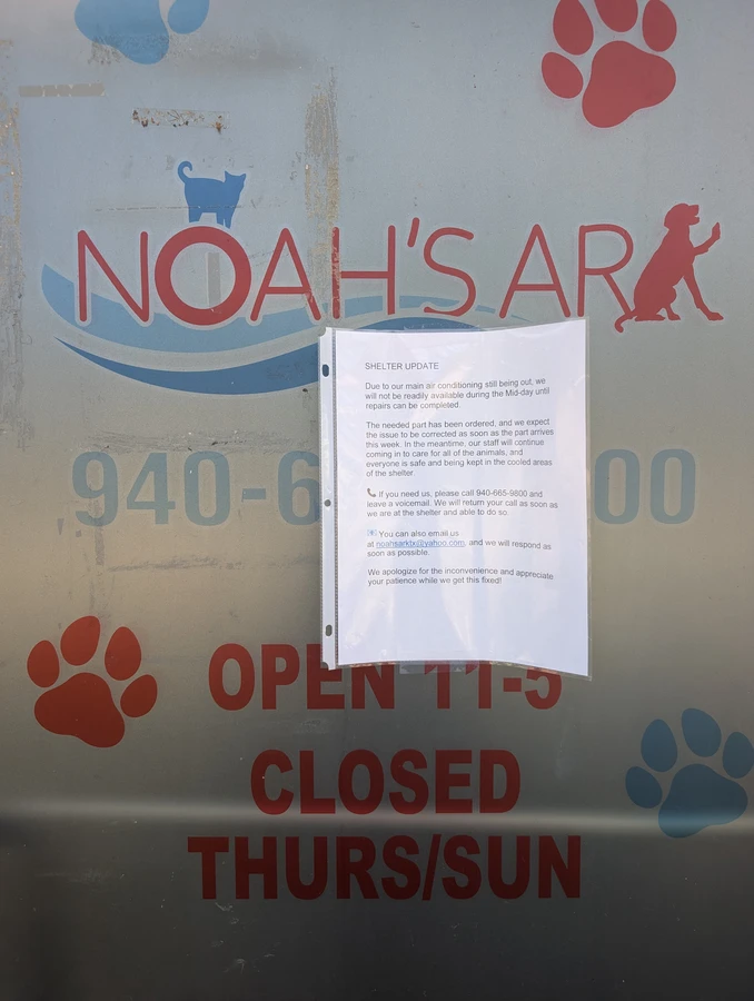 Hours on the door at Noah's Ark SPCA: open 11 to 5, closed Thursday and Sunday.