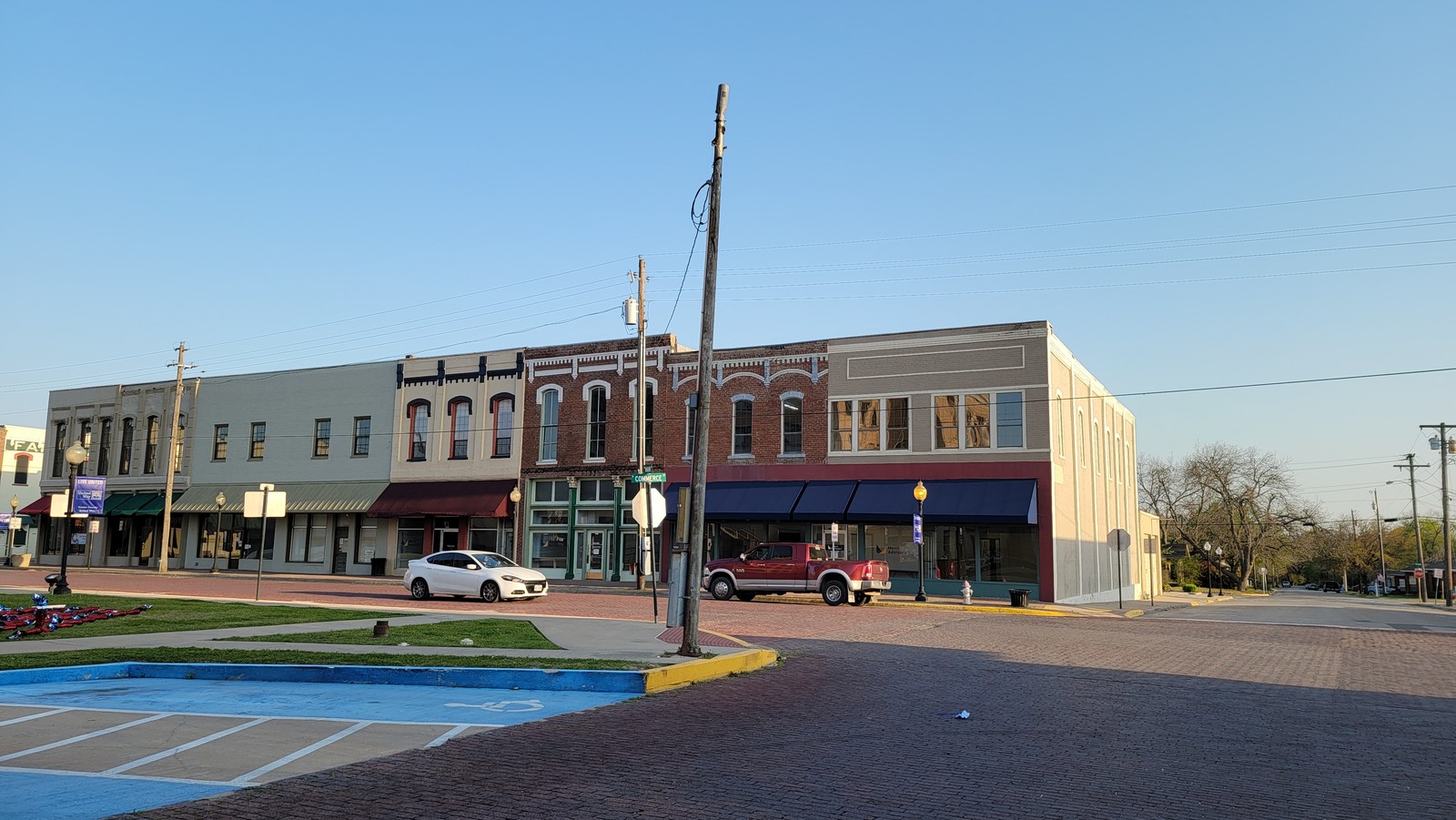 A row of historic brick storefronts in downtown Gainesville, 2021.
