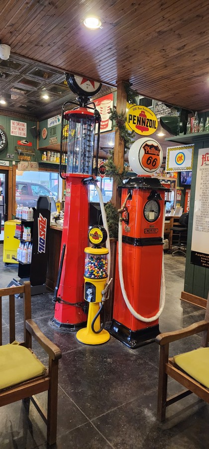 Restored Pennzoil and Phillips 66 pumps in the lobby at Hunter's Oil Depot on West Highway 82.