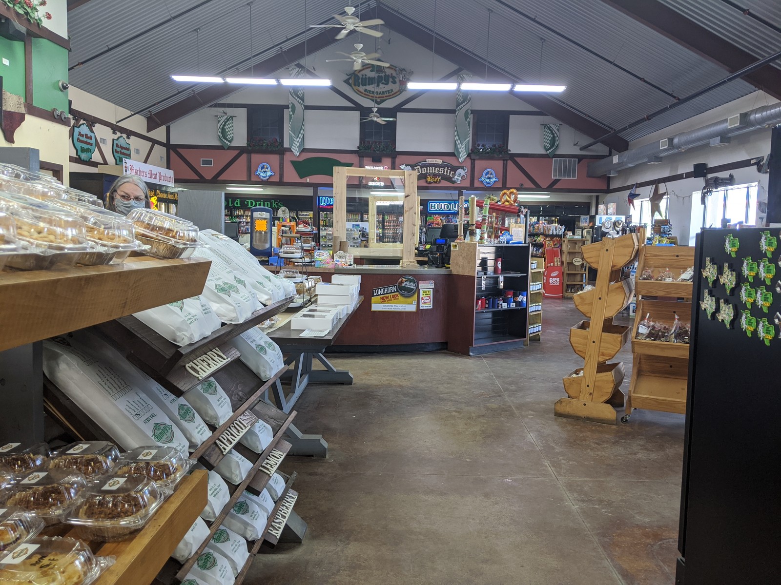 Bread racks and the beer counter inside Rumpy's, May 2020.