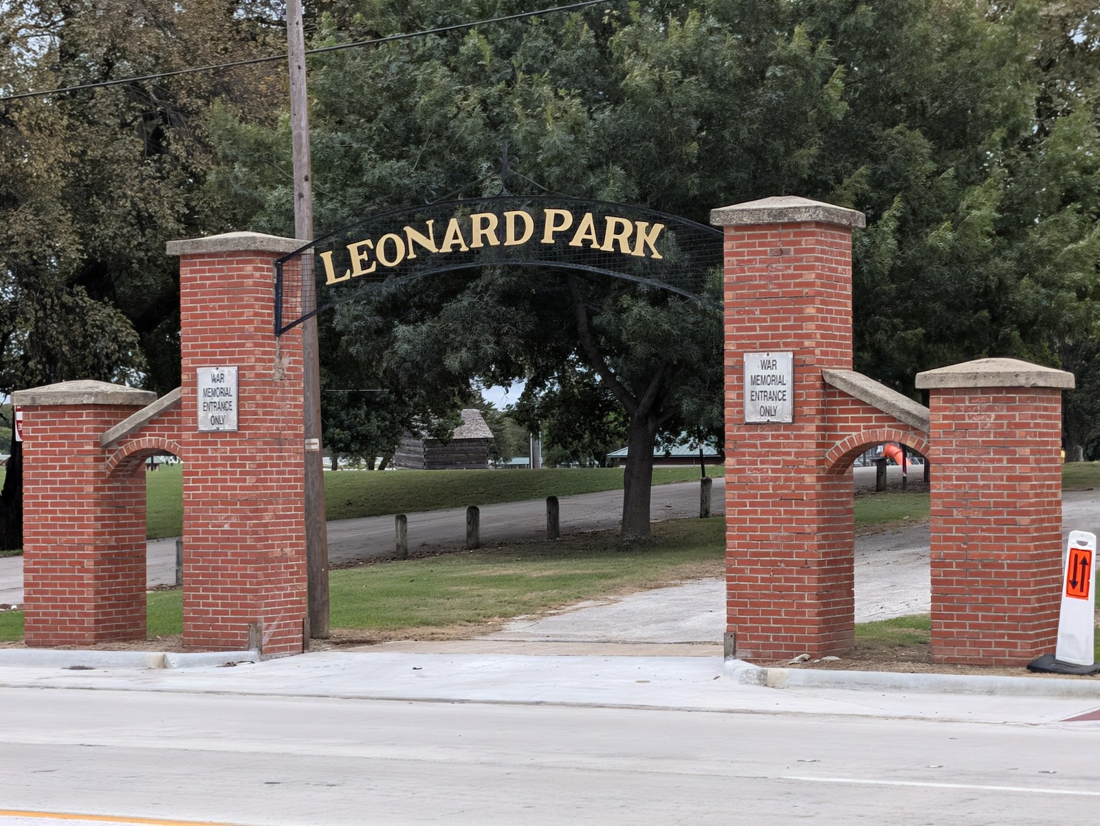 The brick-pillared Leonard Park entrance arch on West California Street.