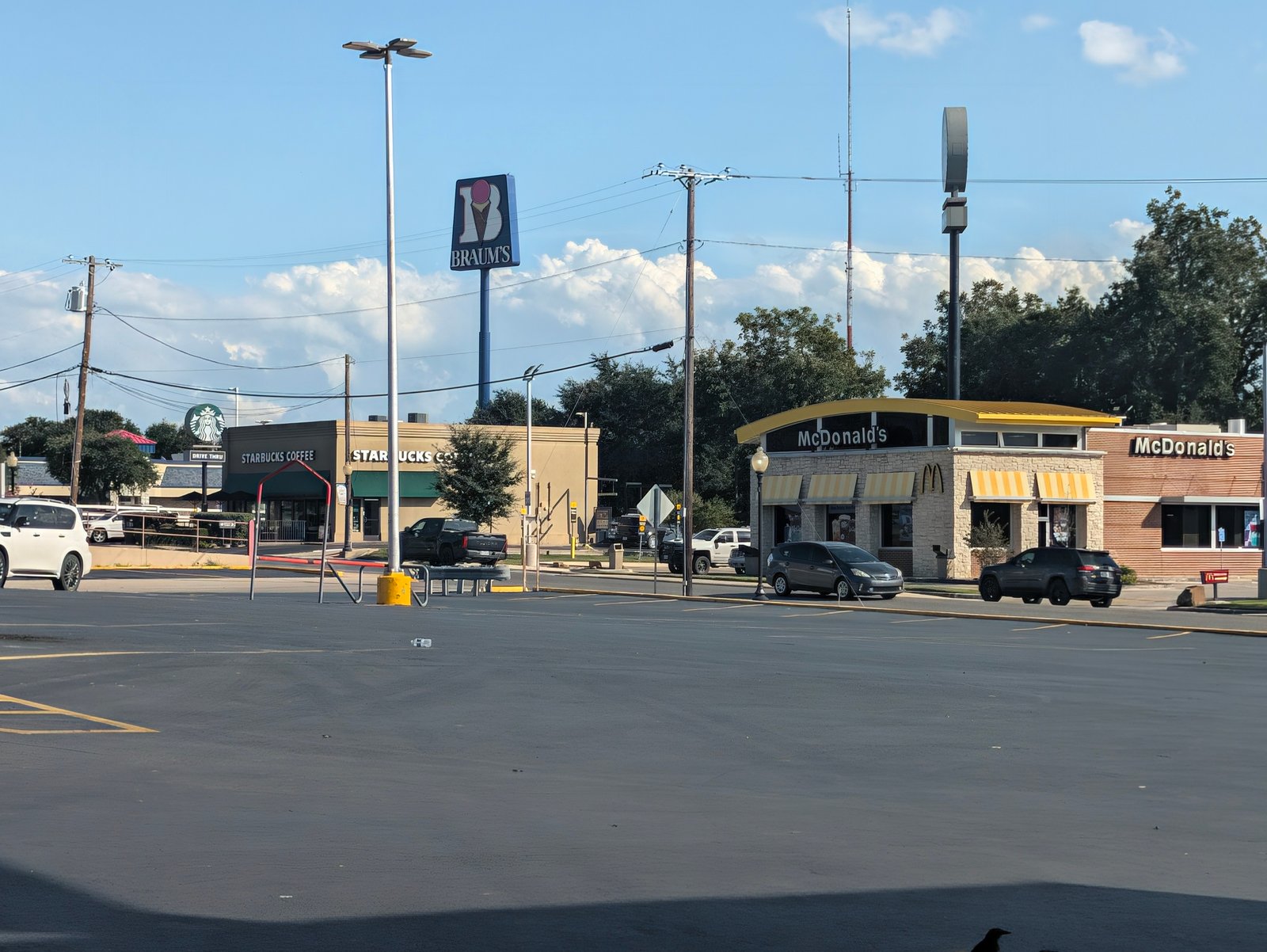Starbucks, McDonald's and the tall Braum's sign line West California Street near I-35.