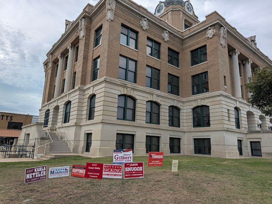 Candidate signs on the courthouse lawn before Election Day.