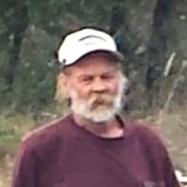Portrait of Johnny Gray